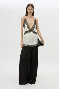 Front view CAMILLA AND MARC Mirage Lace Trim Top in Cream with V‑neck cami silhouette, and lace border trim.