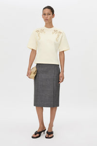 Front-styled view CAMILLA AND MARC Niami Crochet Tee in cream with crochet detailing at the shoulder.