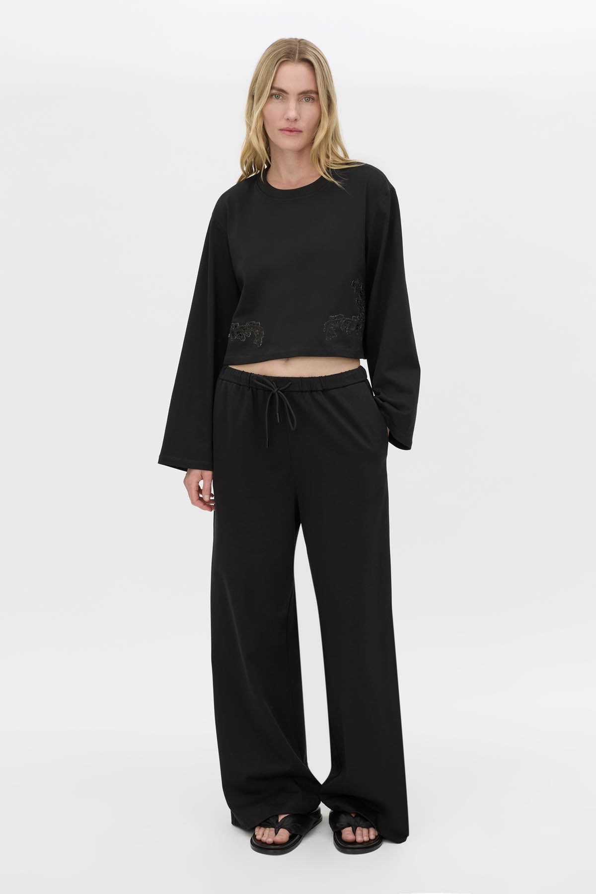 Front-styled view CAMILLA AND MARC Niami Jersey Pant in black with a relaxed straight‑leg fit.