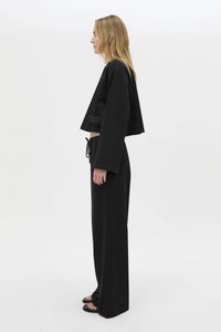 Side view CAMILLA AND MARC Niami Jersey Pant in black with a relaxed straight‑leg fit.