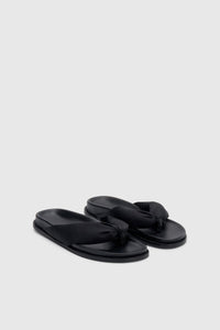 Three-quarter view CAMILLA AND MARC Nina Slide Sandal in Black with padded satin straps.