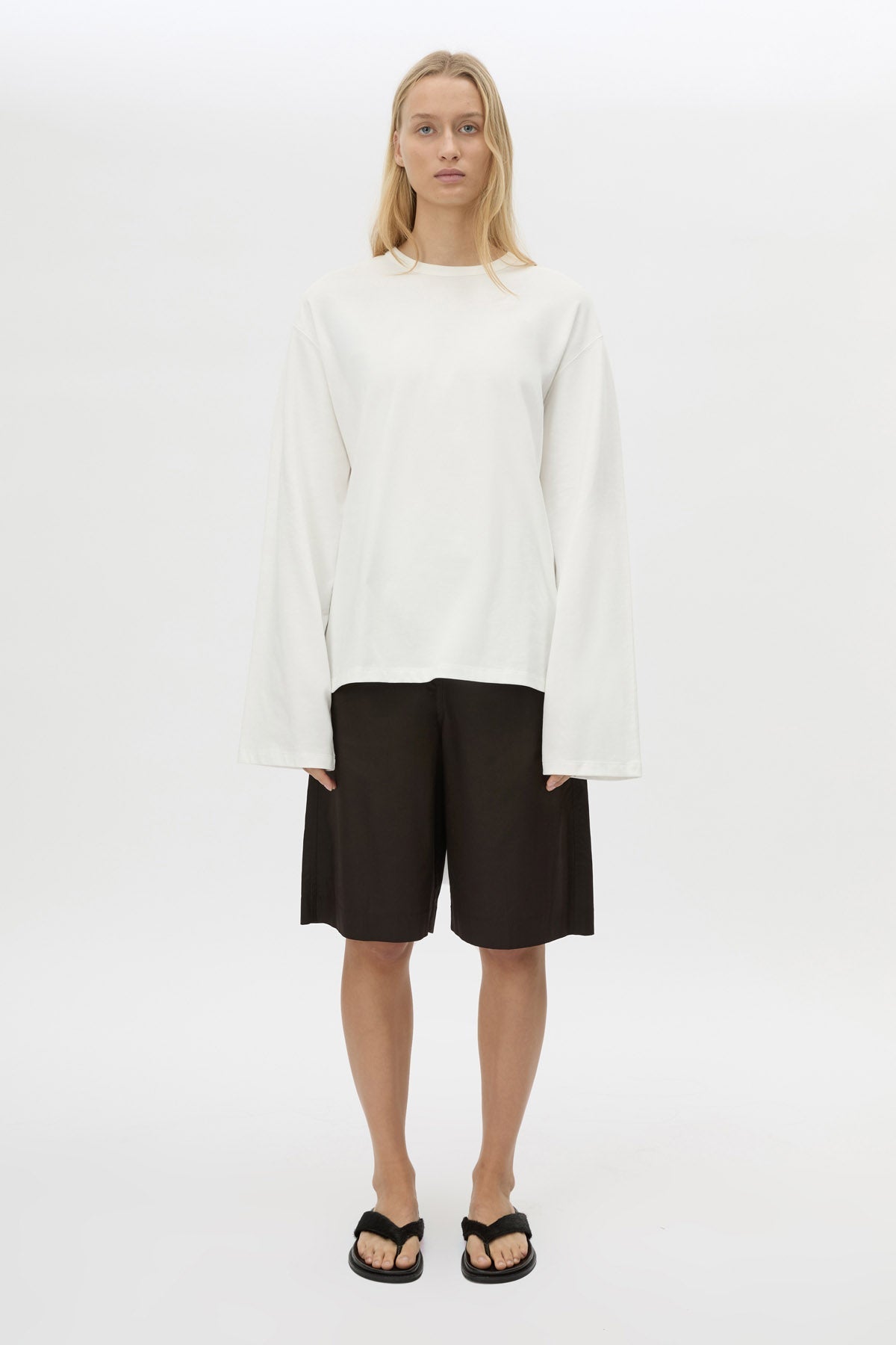 Front view CAMILLA AND MARC Peretti long sleeve tee in white with wide shaped sleeves and ribbed neckline.