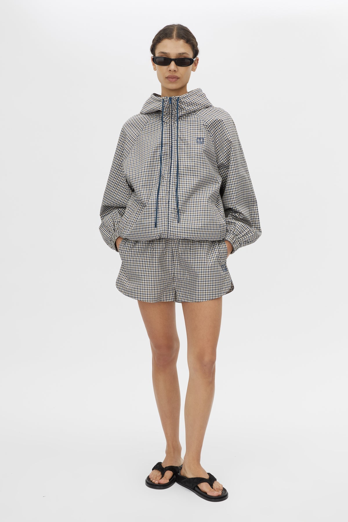 Front view CAMILLA AND MARC Pierce Check Anorak in Birch Check with hooded design and embroidered monogram.