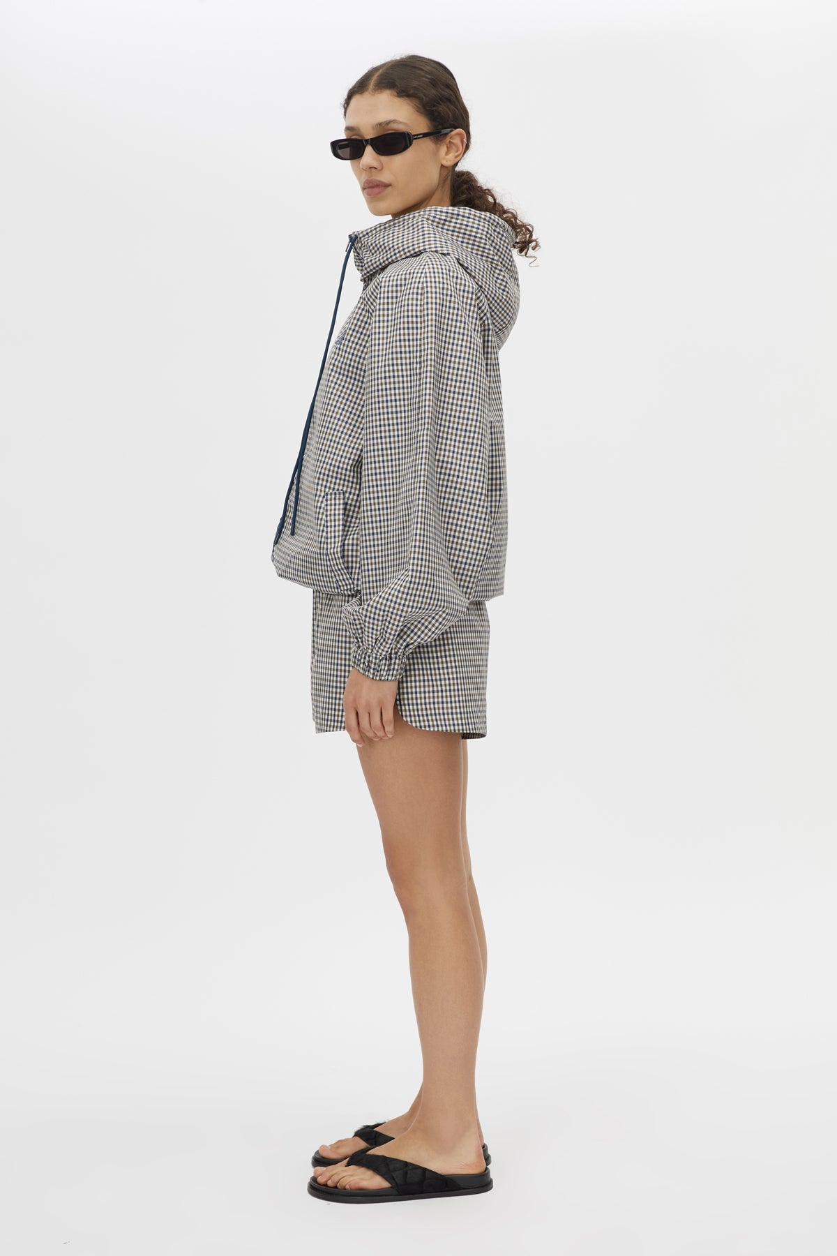 Side view CAMILLA AND MARC Pierce Check Anorak in Birch Check with hooded design and embroidered monogram.