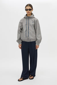 Front styled view CAMILLA AND MARC Pierce Check Anorak in Birch Check with hooded design and embroidered monogram.