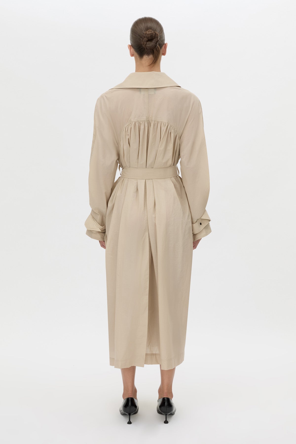 Back view CAMILLA AND MARC Pietro Full Length Sheer Trench in stone with raglan sleeves.