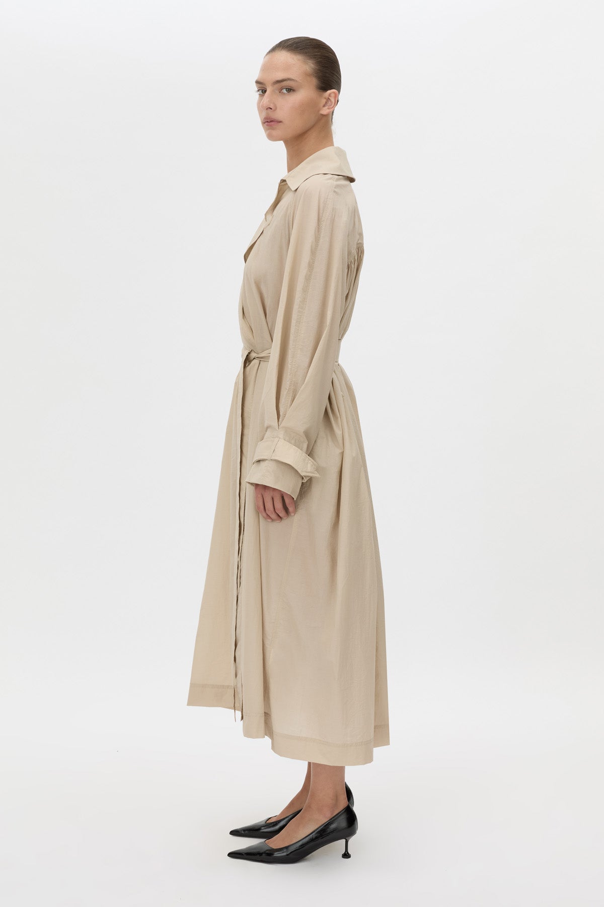 Side view CAMILLA AND MARC Pietro Full Length Sheer Trench in stone with raglan sleeves.