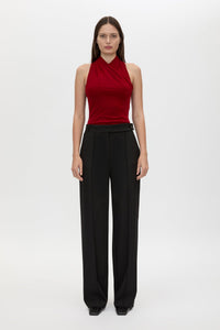 Front styled view CAMILLA AND MARC Ravine Bodysuit in Cherry Red with cross‑over neckline silhouette. 