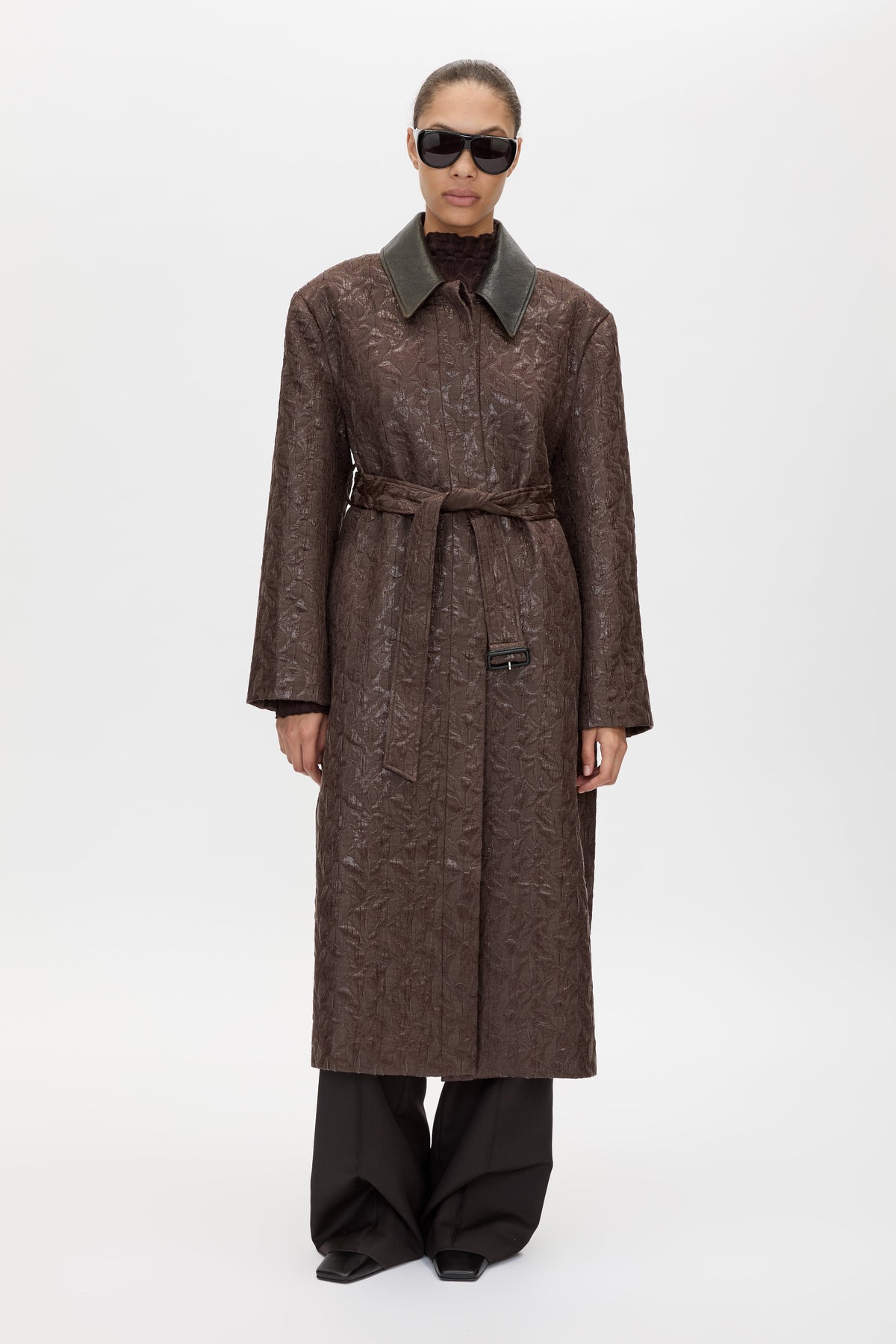 Styled view CAMILLA AND MARC full-length Rennick Oversized Coat in chocolate brown with contrast leather collar and buckle belt. 