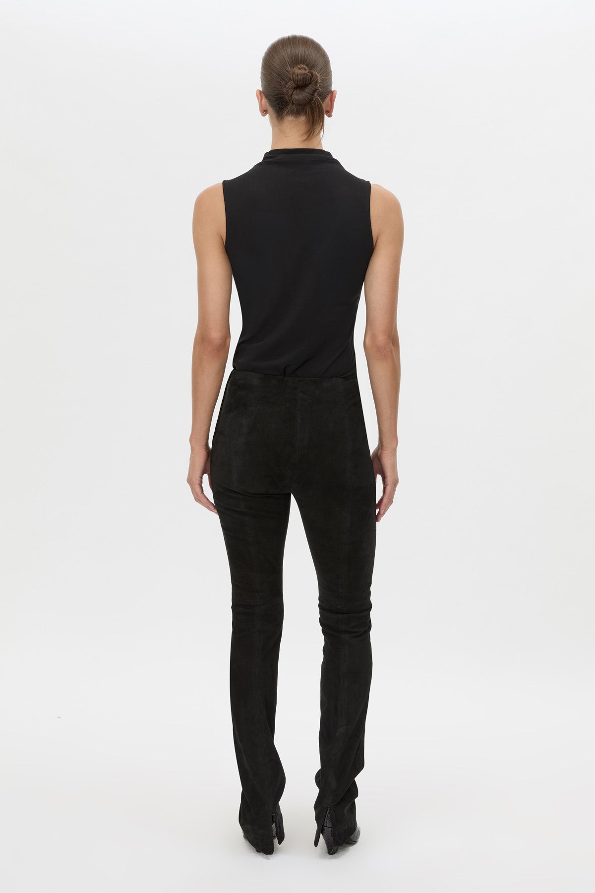 Back view CAMILLA AND MARC high-waisted Romina Pant in black stretch suede fabrication.