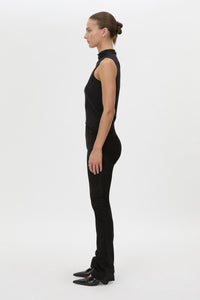 Side view CAMILLA AND MARC high-waisted Romina Pant in black stretch suede fabrication.