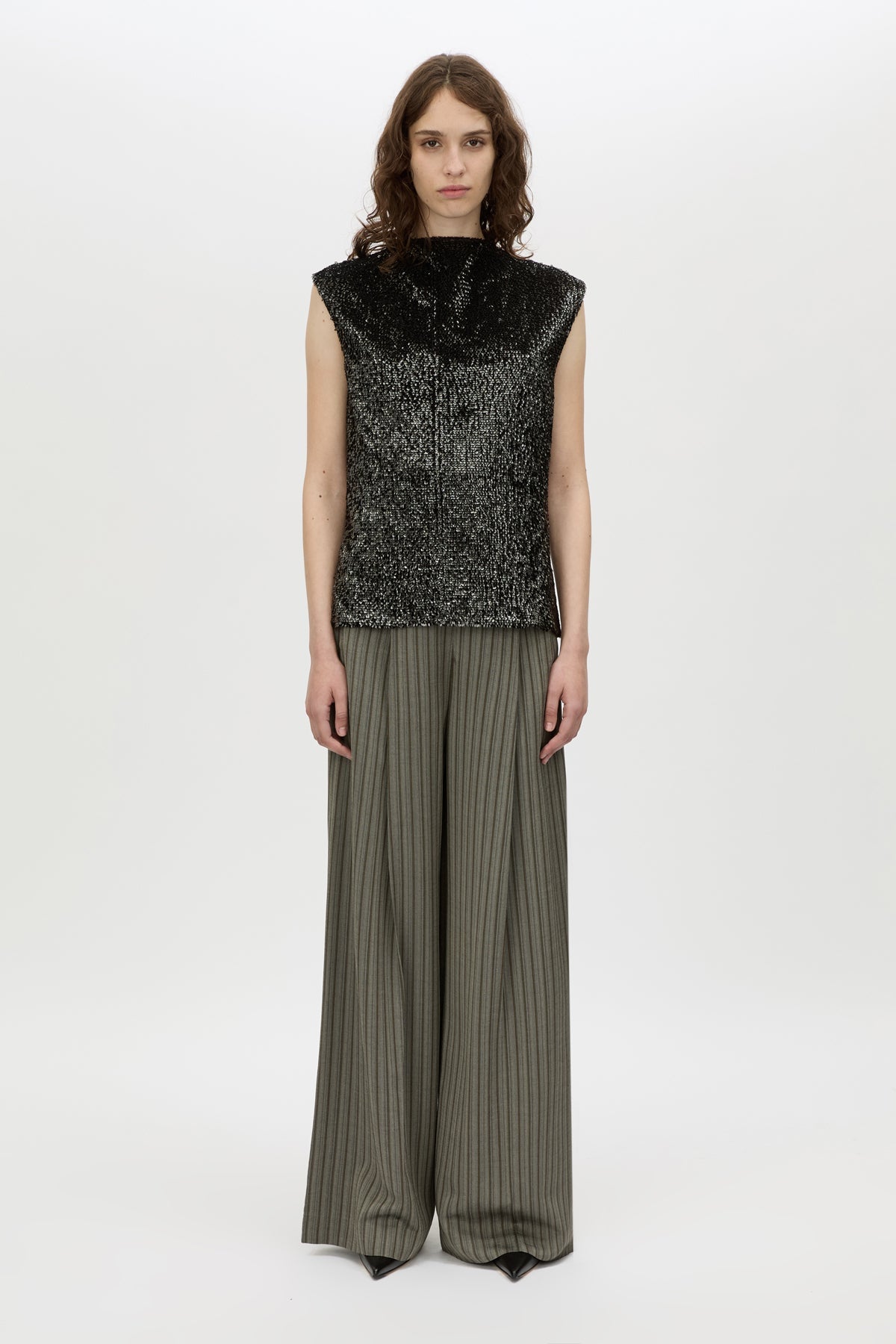 Front styled view CAMILLA AND MARC Sabel Top in Black with sequin finish and high crew neckline.
