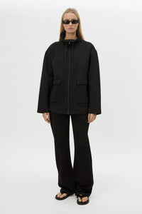 Front view CAMILLA AND MARC Salem Bonded Fleece Jacket in black with high collared neckline.