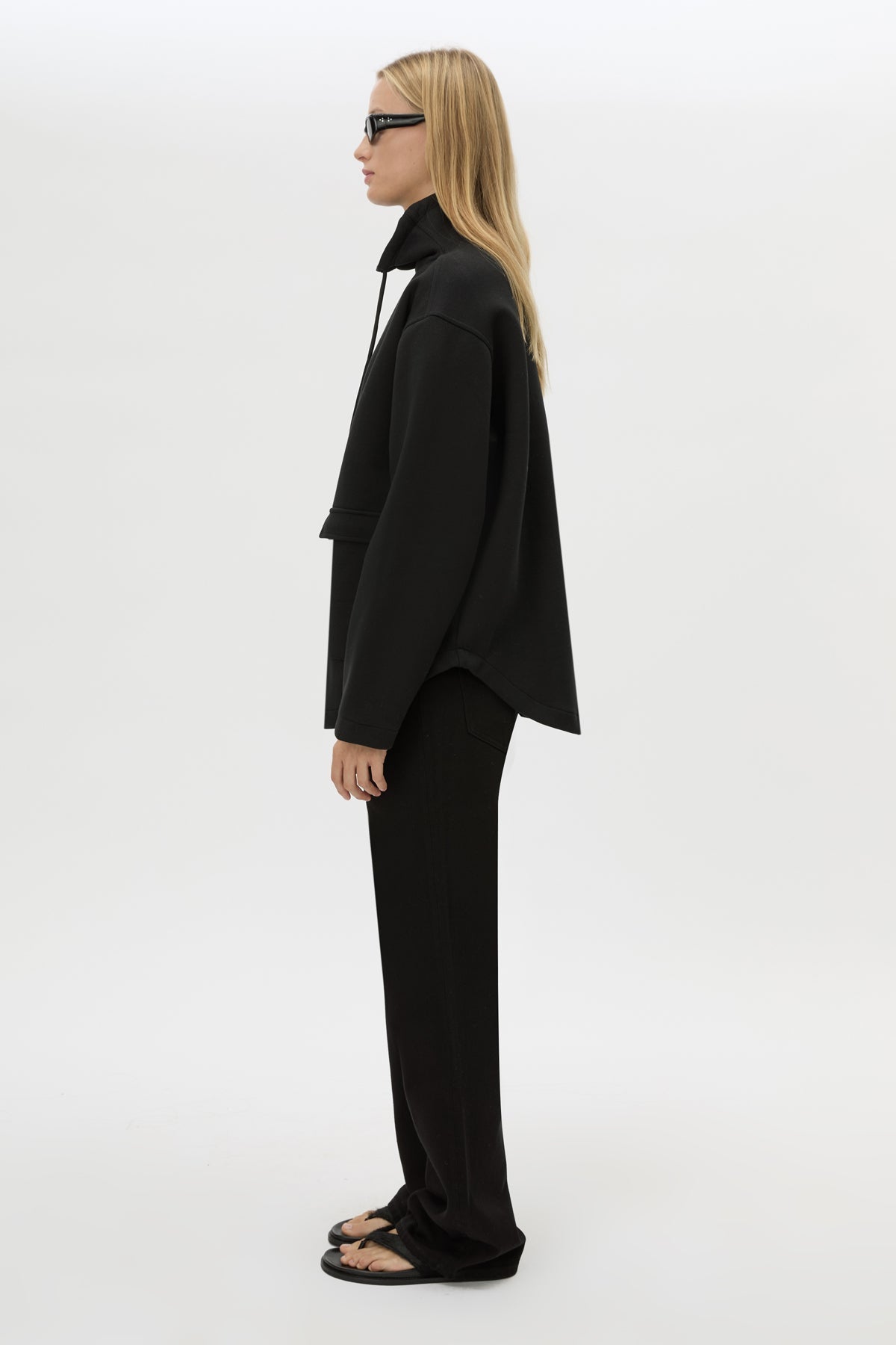 Side view CAMILLA AND MARC Salem Bonded Fleece Jacket in black with high collared neckline.