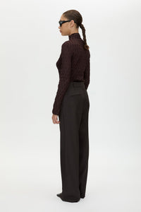 Back view CAMILLA AND MARC Sissil Top in Chocolate with long sleeves and funnel neckline.