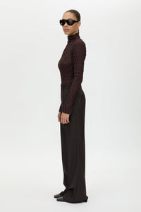 Side view CAMILLA AND MARC Sissil Top in Chocolate with long sleeves and funnel neckline.