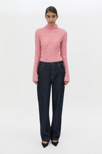 Front styled view CAMILLA AND MARC Sissil Top in Powder Pink jersey with long sleeves and funnel neck.