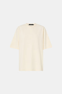 Ghost view CAMILLA AND MARC Studio Graphic Tee in White with short sleeves and boucle embroidered monogram.  