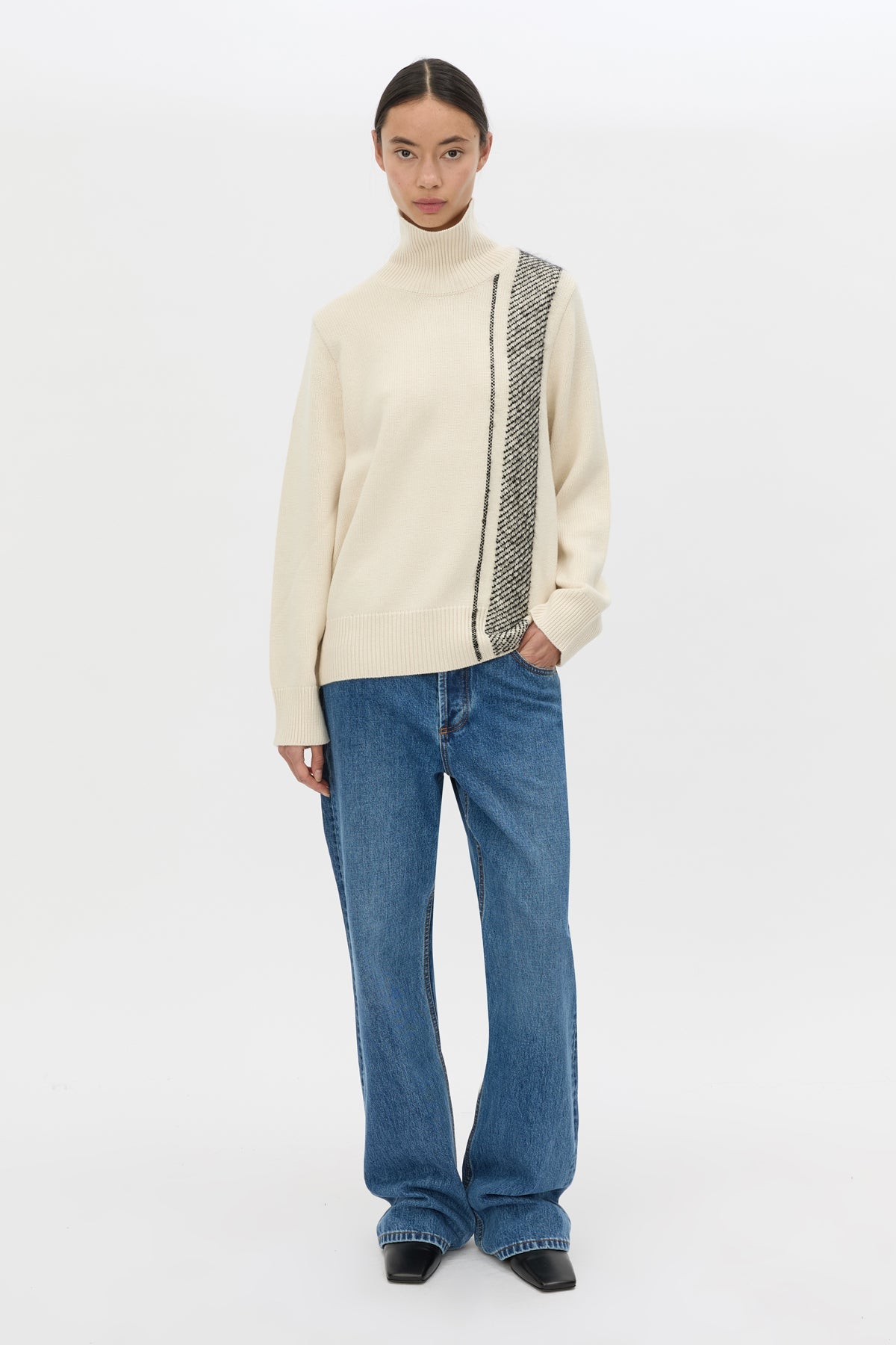 Front view CAMILLA AND MARC Tusk Detail Knit Turtleneck in Black with contrast jacquard stripe and Australian wool.