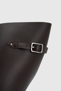 Cropped view CAMILLA AND MARC Willa Tote in Chocolate Brown with side strap and buckle detailing and magnetic button closure.