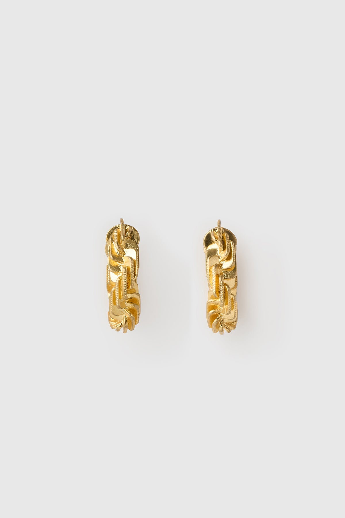 Side view CAMILLA AND MARC Wrenley Hoops with worn‑look 18k gold plating.