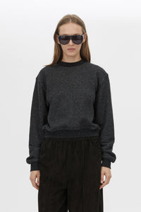 Cropped view CAMILLA AND MARC Everett Sweater in Black with cropped speckled fleece and relaxed turtle‑neck silhouette.  